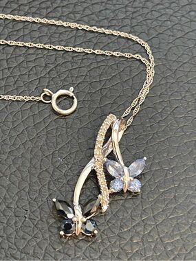 Double butterfly pendant necklace